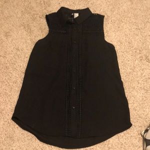 Sleeveless black blouse